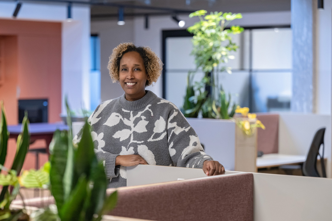 A woman standing in an office A woman standing in an office